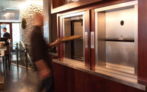 Worker Using Dumbwaiter