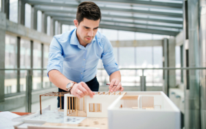 Architect Working On Model